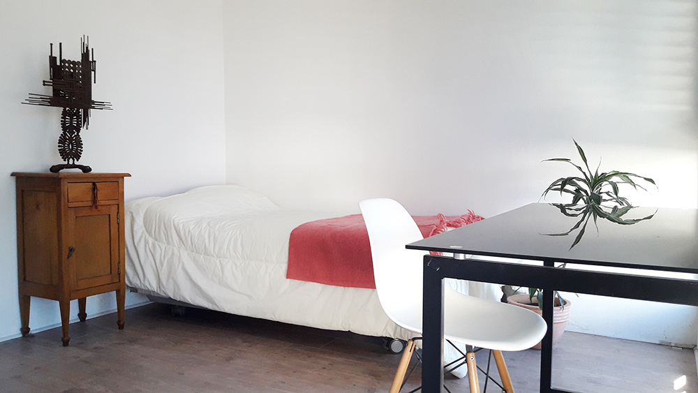 Interior y habitaciones de la residencial para estudiantes Casa Crisol en Concepción