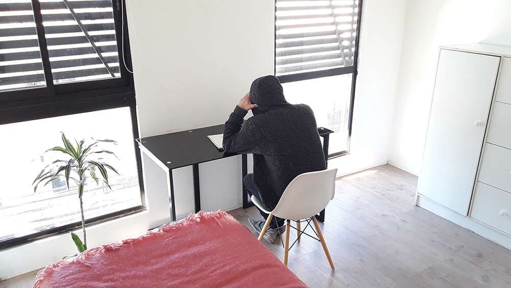 Interior y habitaciones de la residencial para estudiantes Casa Crisol en Concepción